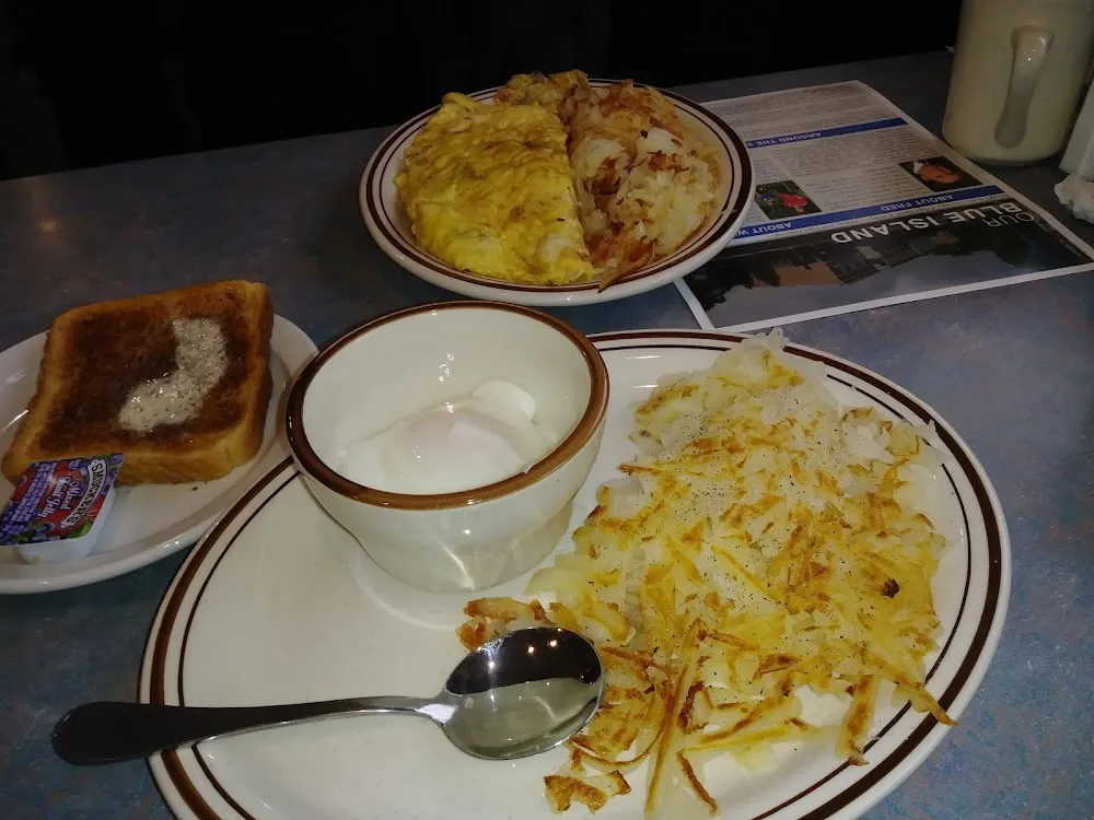 2 Soft Poached Eggs on Hash Browns